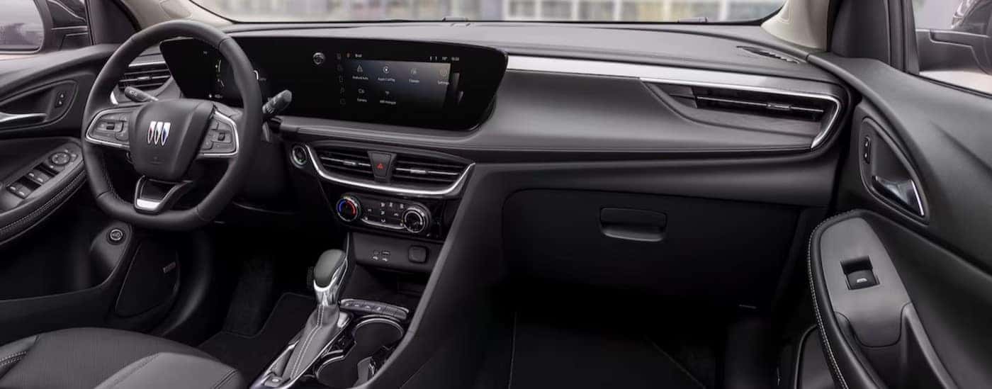 The black interior and dash in a 2023 Buick Encore GX is shown.