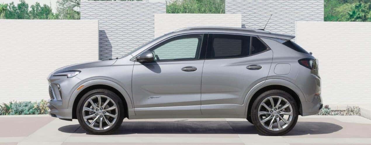 A silver 2025 Buick Encore GX Avenir is shown from the side.