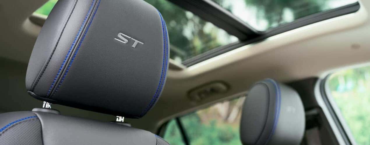 A close up shows black leather headrests in a 2025 Buick Encore GX ST.