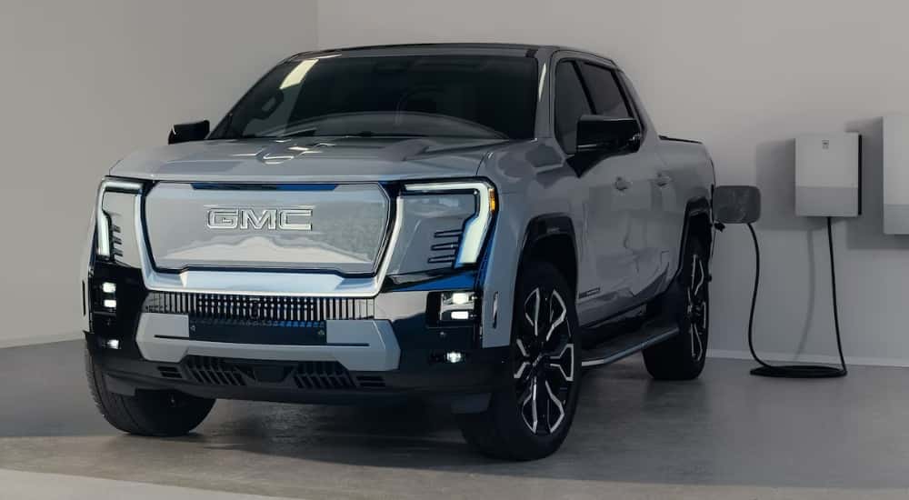 Grey 2024 GMC Sierra EV charging