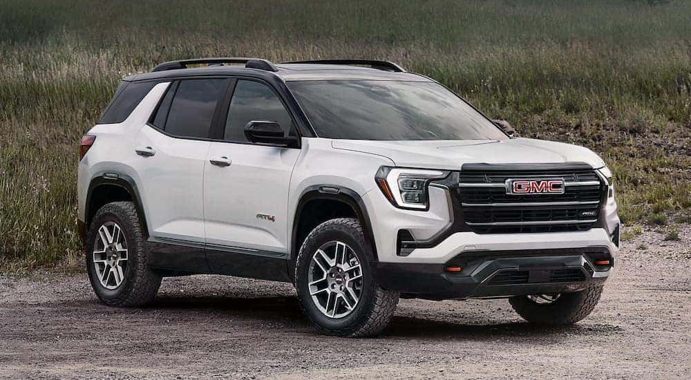 White 2026 GMC Terrain AT4 for sale parked off-road.