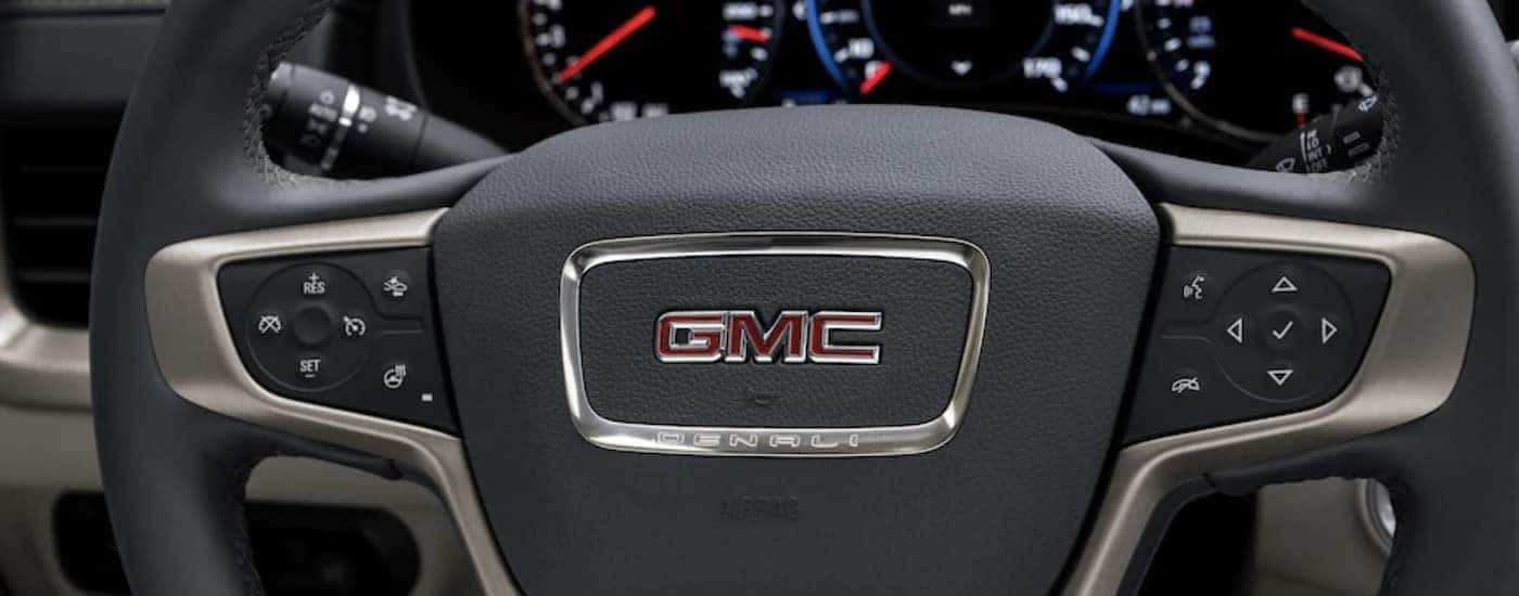 Close-up of the steering wheel on a 2023 GMC Terrain at a dealer Near Marietta