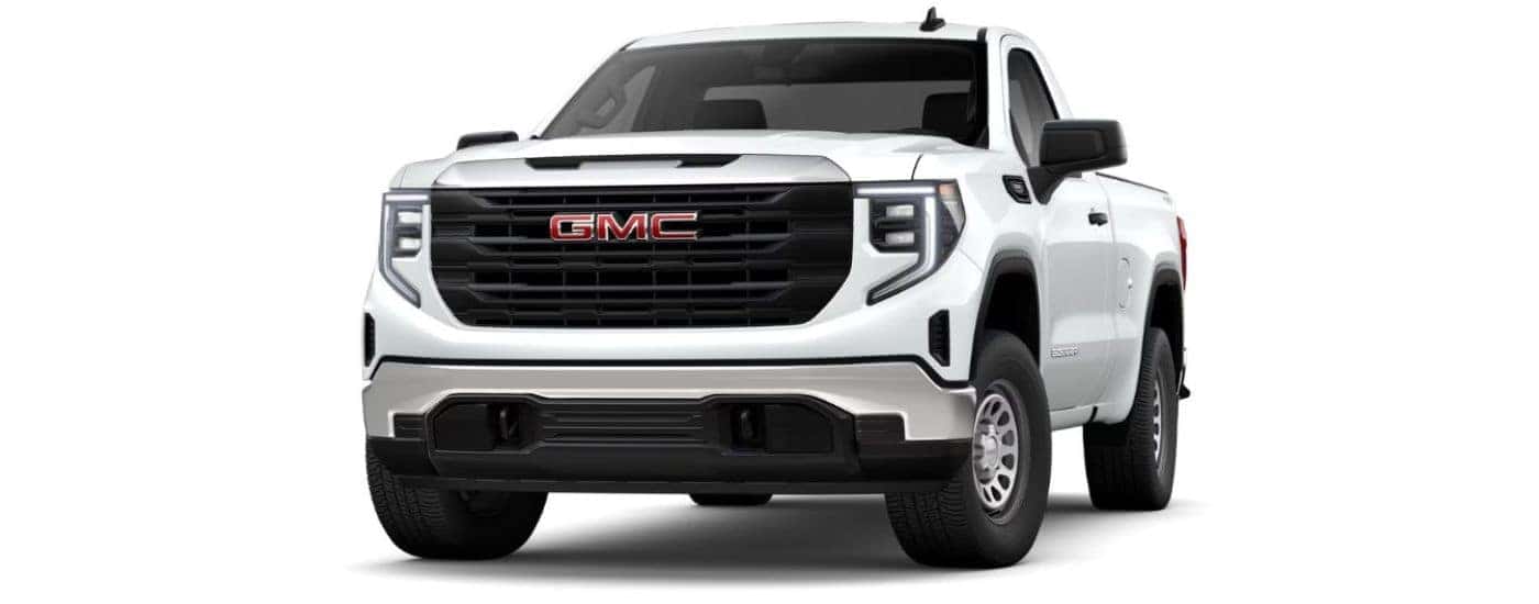 A white 2025 GMC Sierra 1500 Denali angled left.