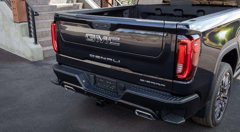 Tailgate and bed of a black 2024 GMC Sierra 1500 Denali.