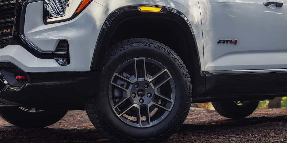 Front view of a GMC Terrain AT4 for sale near Marietta at an angle from below.
