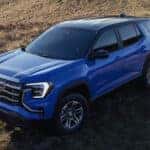 Exterior view from above of a Blue 2026 GMC Terrain for sale near Marietta.