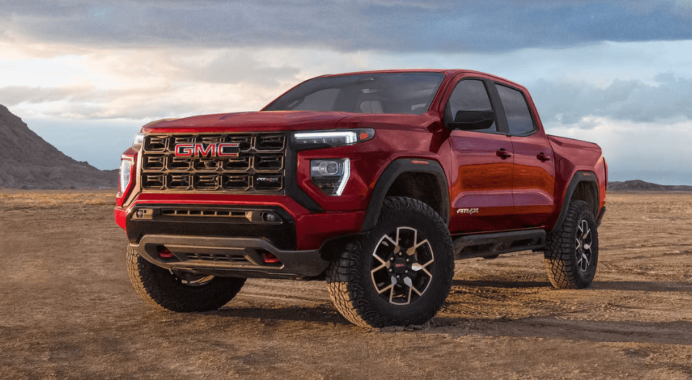 Red 2026 GMC Canyon AT4 parked off road