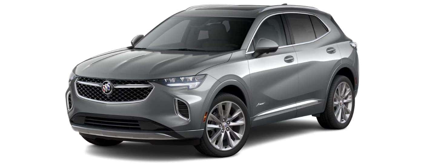 A silver 2023 Buick Envision Avenir is angled left.