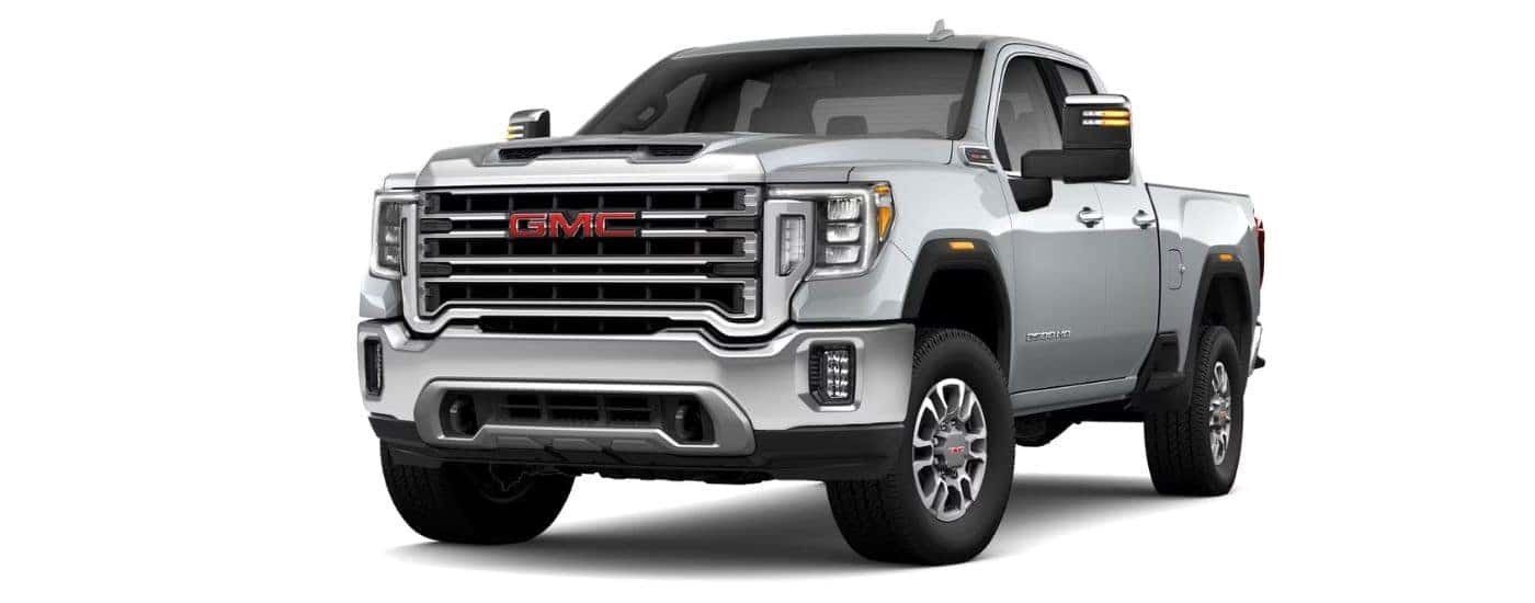 A silver 2023 GMC Sierra 2500 HD SLT is angled left.