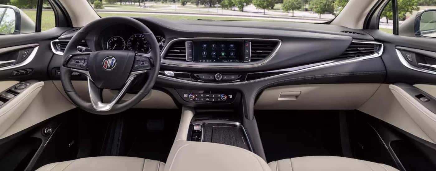 Black and white interior and dash of a 2024 Buick Enclave