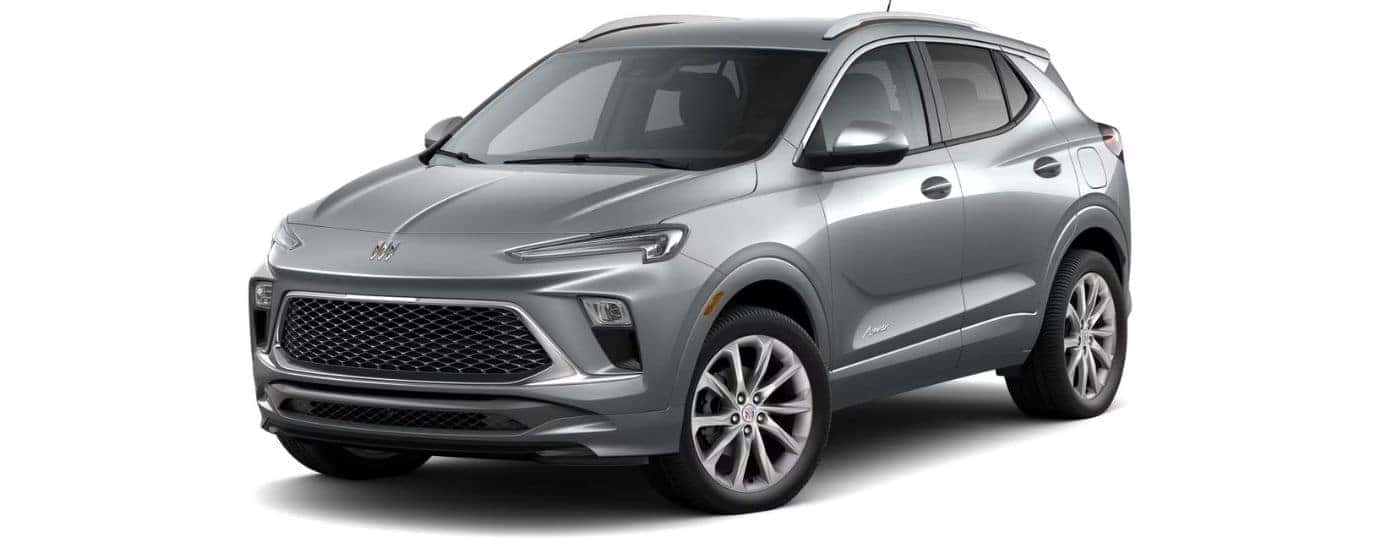 A silver 2025 Buick Encore GX Sport Touring is angled left.