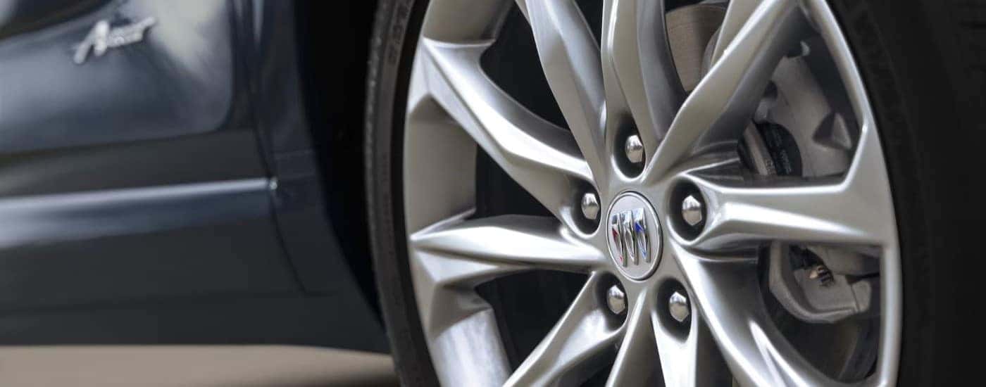 Wheel on a blue 2024 Buick Encore GX Avenir