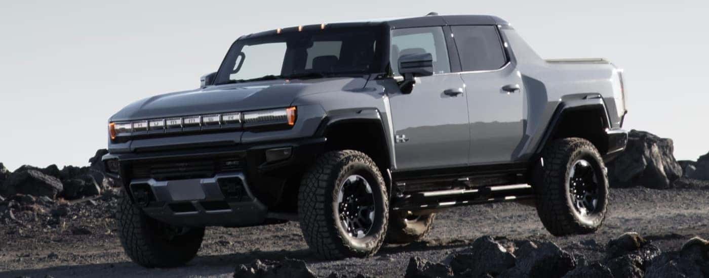 Grey 2024 GMC Hummer EV off-roading