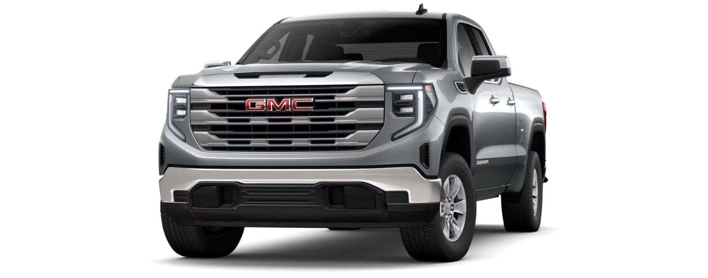 A silver 2024 GMC Sierra 1500 SLE is angled left.