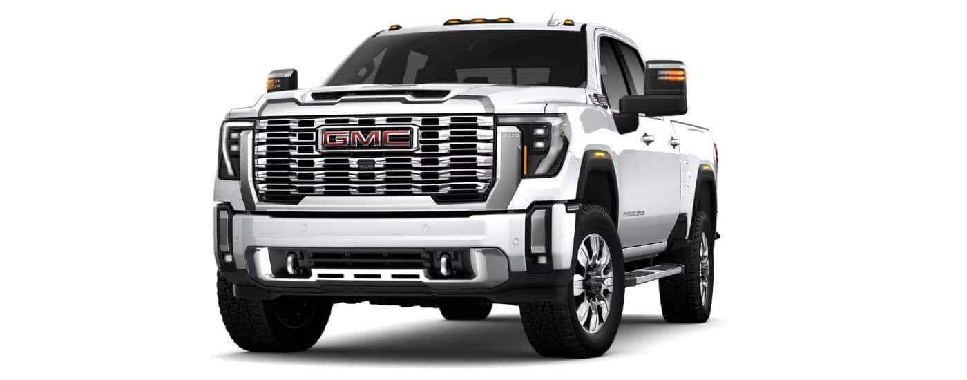 A white 2024 GMC Sierra 2500 HD Denali is angled left.