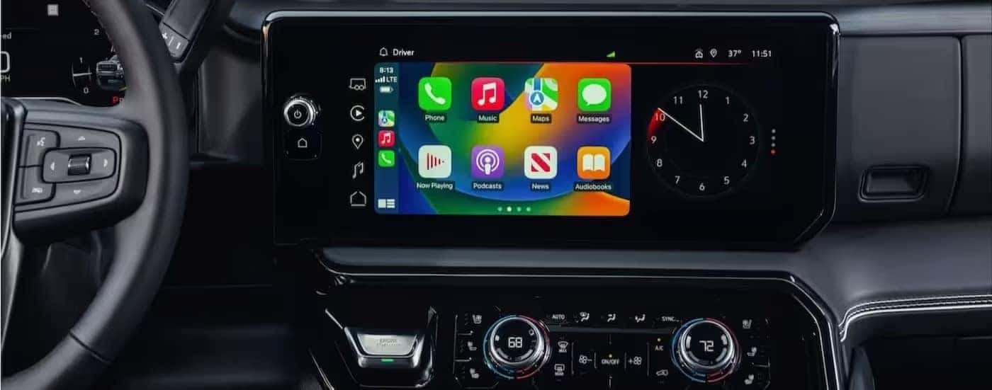 A close-up of an infotainment display in a 2024 GMC Sierra 3500 HD is shown.