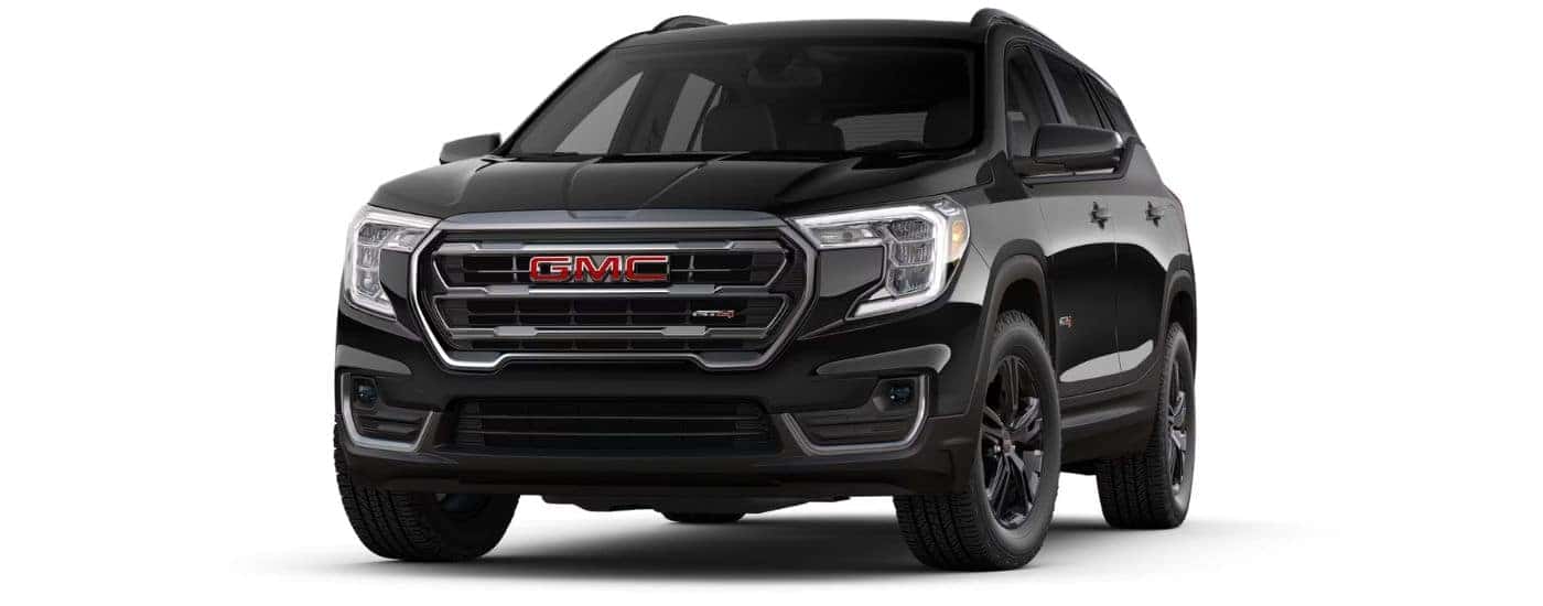 A black 2024 GMC Terrain AT4 is angled left.