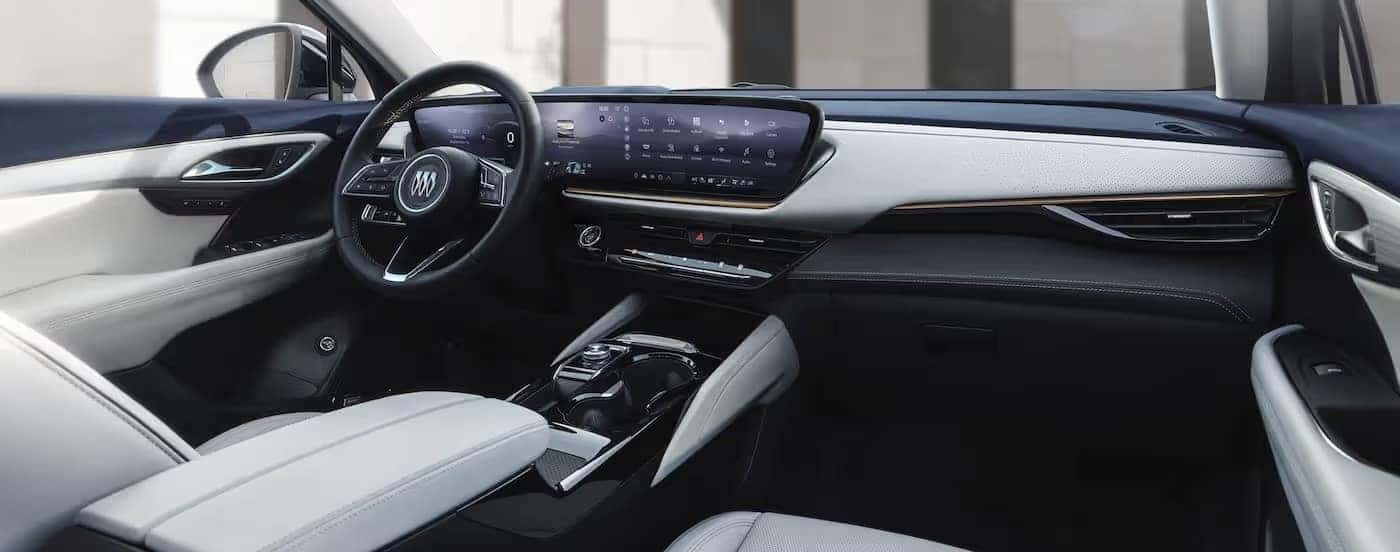 The black and gray interior and dash are shown in a 2025 Buick Envision.