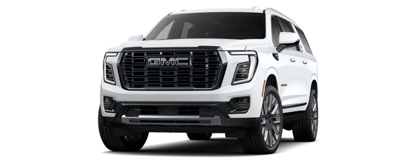 A white 2025 GMC Yukon Denali Ultimate is angled left.