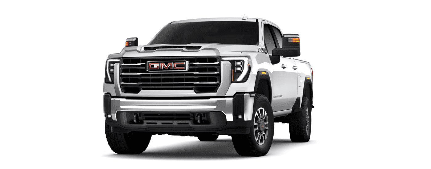 A white 2024 GMC Sierra 3500 HD is angled left.