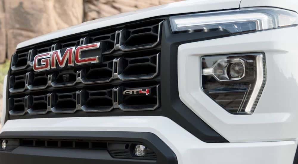 White 2026 GMC Canyon AT4 grill close up