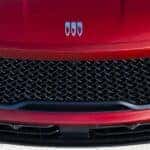 Front grille of a red 2026 Buick Enclave ST.