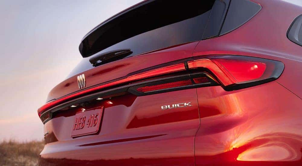 Rear view close-up of a red 2026 Buick Enclave.