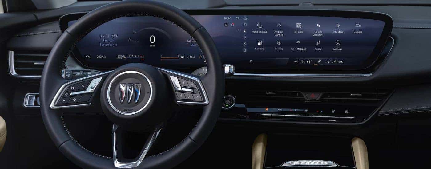 The steering wheel and infotainment system on a 2026 Buick Envision.