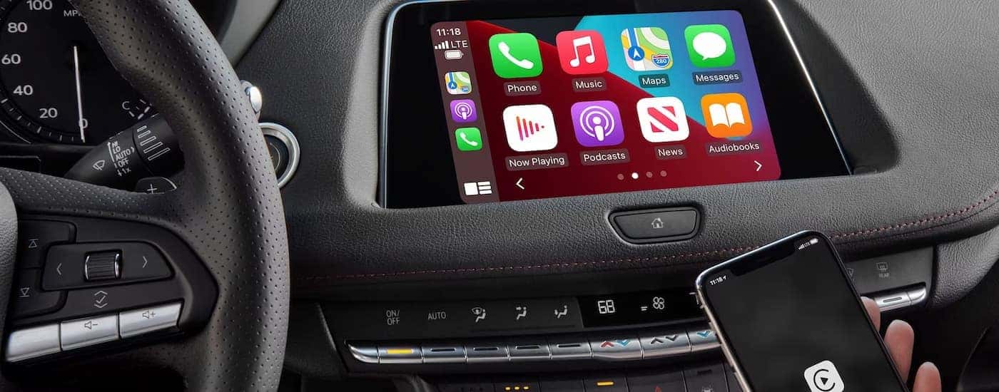 A closeup of the infotainment screen in a 2023 Cadillac XT4 is shown during a 2023 Cadillac XT4 vs 2023 Acura RDX comparison.