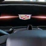 The Cadillac logo is shown displayed on the dash of a 2024 Cadillac Escalade ESV.