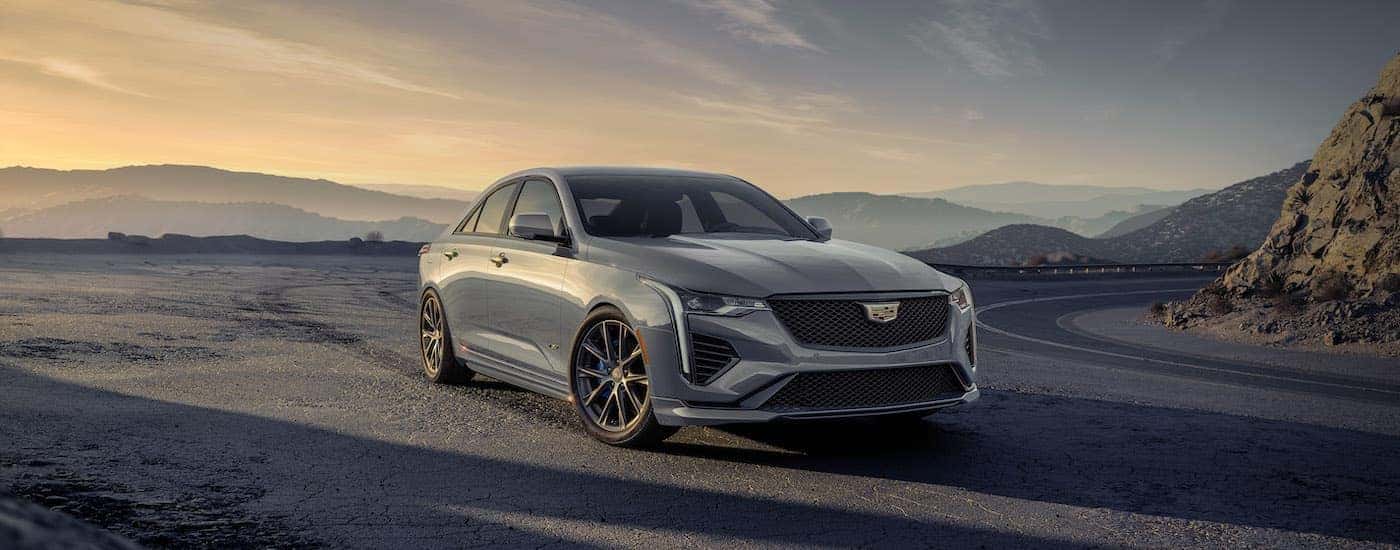A silver 2024 Cadillac CT4-V is shown from the front at an angle.