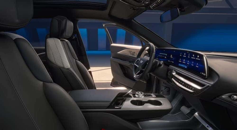 The gray interior and dash of a 2024 Cadillac LYRIQ is shown.