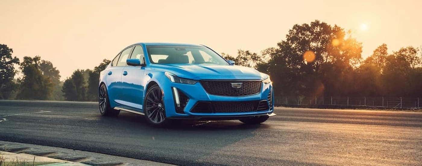 A blue 2023 Cadillac CT5-V Blackwing is shown parked on a track after visiting a Cadillac service center near Doraville.