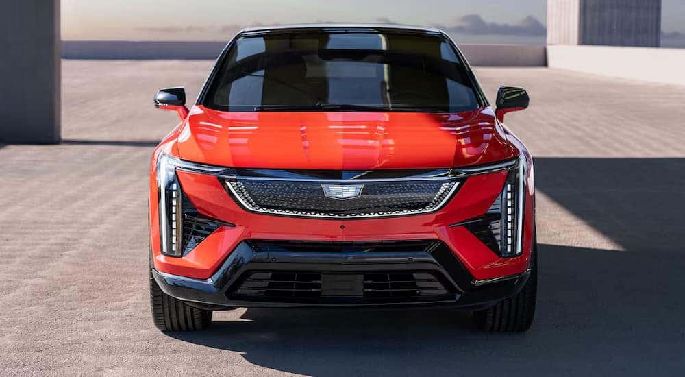A front view of a red 2025 Cadillac OPTIQ.