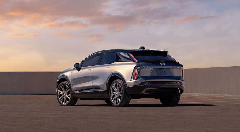A rear view of a grey 2025 Cadillac OPTIQ.