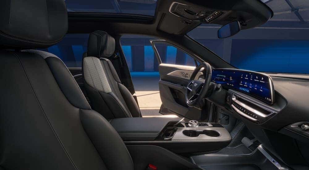 Side angle view of the black interior cabin of a 2024 Cadillac LYRIQ.