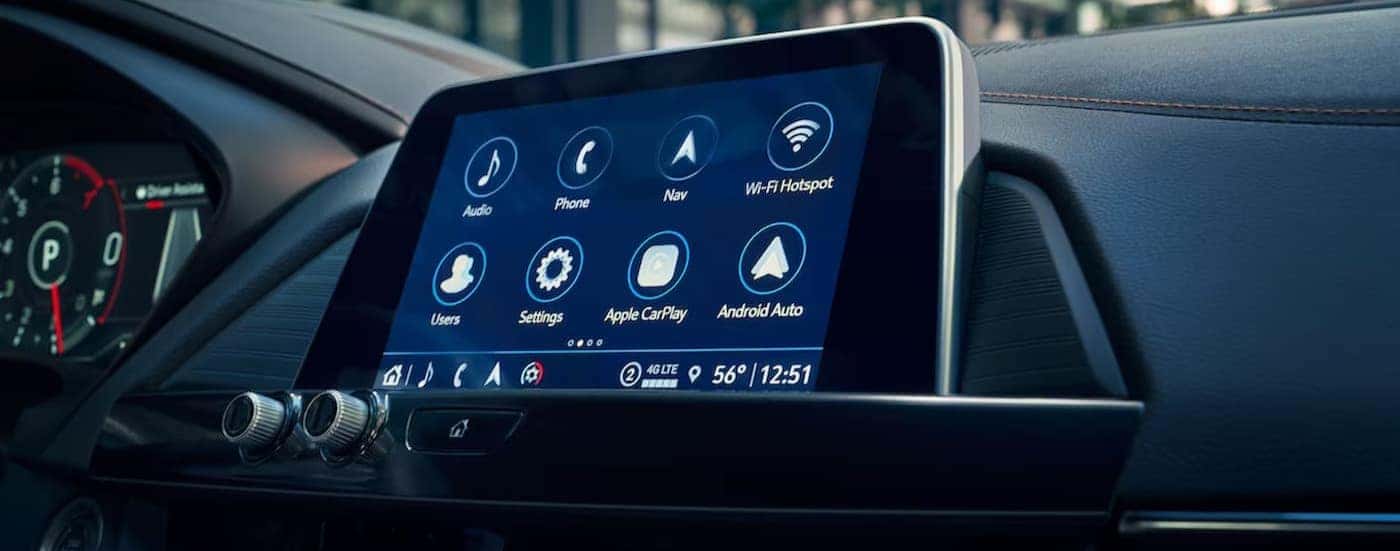 A close-up of the infotainment screen in a 2025 Cadillac CT4 is shown.