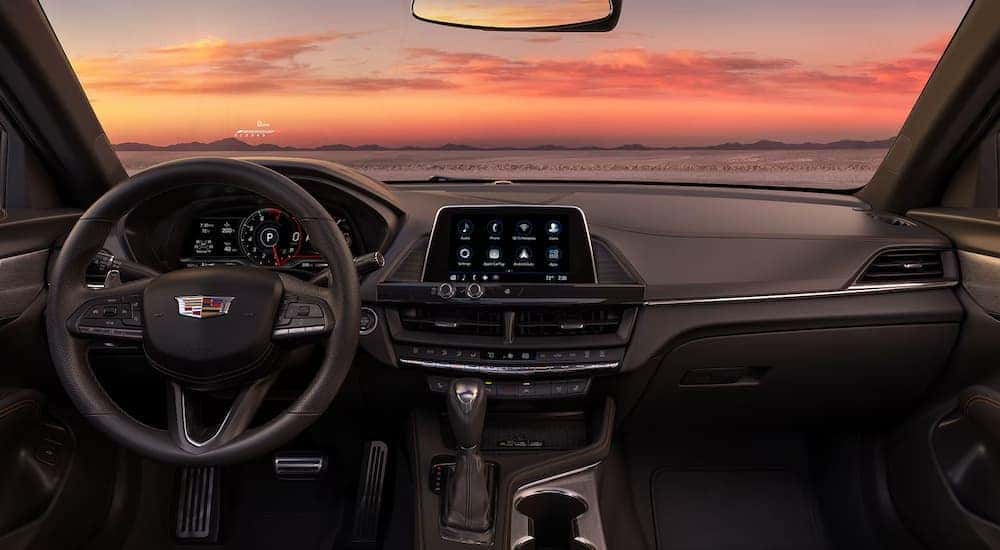 The black interior cabin of a 2025 Cadillac CT4.