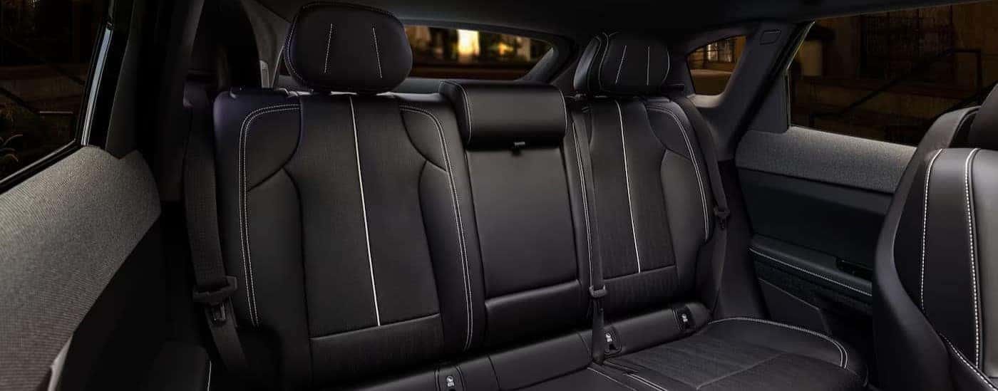 The black trear interior is shown in a 2025 Cadillac OPTIQ.