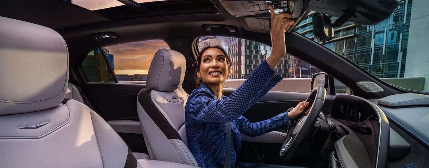 A person sitting in a 2025 Cadillac XT4.