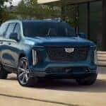 A parked blue 2025 Cadillac Escalade for sale near Chamblee.