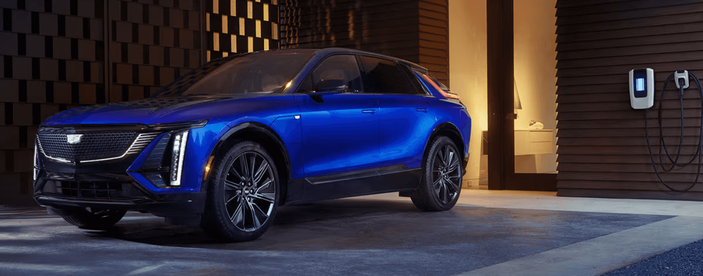 A blue 2025 Cadillac LYRIQ charging