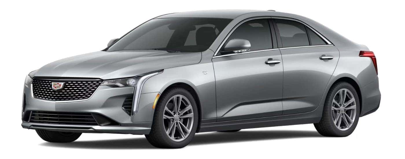 A silver 2024 Cadillac CT4 is angled left.