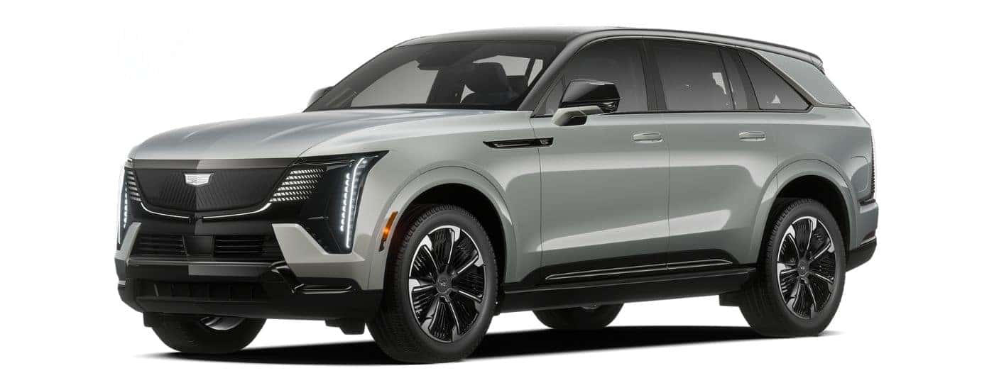 A silver 2025 Cadillac Escalade IQ is angled left.