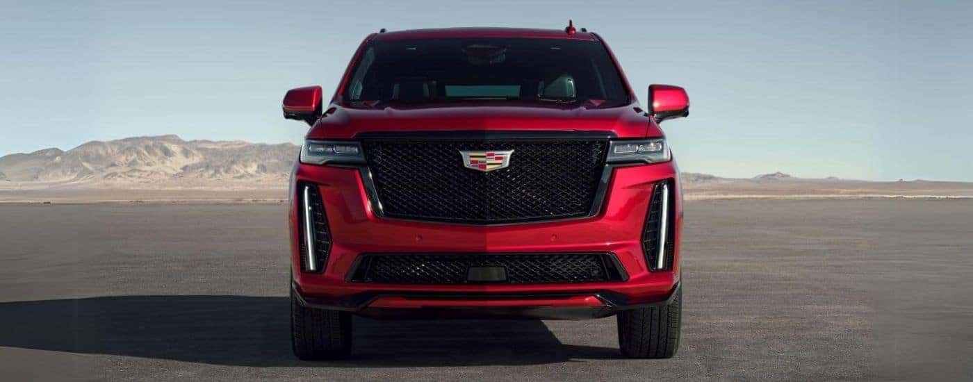 A red 2023 Cadillac Escalade V is shown from the front.