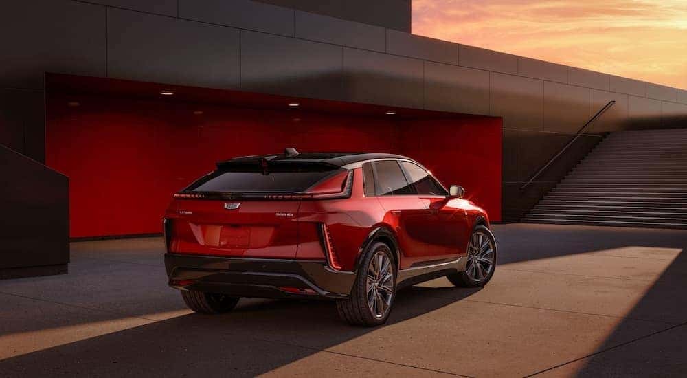 Red 2025 Cadillac LYRIQ parked in a building.