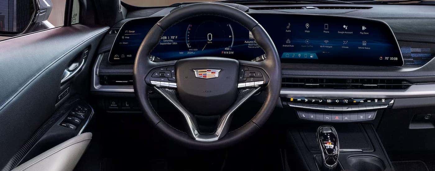 Infotainment and digital gauge cluster on a 2025 Cadillac XT4 for sale near Sandy Springs