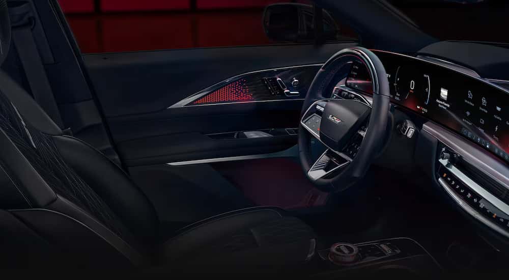 Black leather interior of a 2026 Cadillac LYRIQ-V from the side.