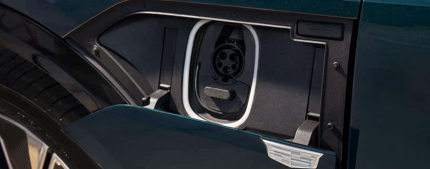 Charging port on a green 2026 Cadillac LYRIQ For sale near Milton