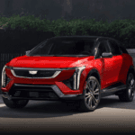 Red 2026 Cadillac OPTIQ head on